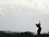 Tiger Woods hits his second shot on the sixth hole during the fourth round of the Farmers Insurance Open golf tournament, at the Torrey Pines Golf Course on Sunday, Jan. 27, 2013, in San Diego. (AP Photo/Gregory Bull)