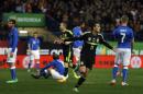 Spain's Pedro Rodriguez, centre, celebrates his goal during a international friendly soccer match between Spain and Italy at the Vicente Calderon stadium in Madrid, Spain, Wednesday, March 5, 2014. (AP Photo/Andres Kudacki)