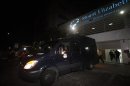 Police van carrying the body of Indian rape victim leave Mount Elizabeth Hospital for the morgue in Singapore