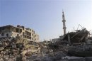 A view shows buildings damaged by what activists say were missiles fired by forces loyal to Syria's President Assad in Saqba