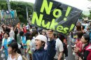 Anti nuclear activists hold a rally to protest against resume of nuclear power plant at Oi town in Fukui on July 1, 2012