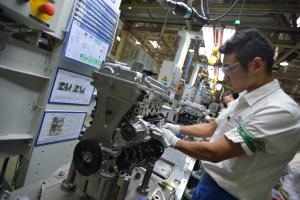 A man works in Shanghai GM&#39;s factory in Wuhan,&nbsp;&hellip;