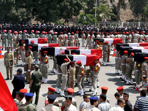 صور/ تغطية أخبارية /جنازة العسكريين المصريين 527493d8-03c9-4db1-bf5e-6bf817185981-jpg_062404