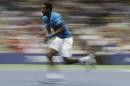 Gael Monfils, of France, chases down a shot from Lucas Pouille, of France, during the quarterfinals of the U.S. Open tennis tournament, Tuesday, Sept. 6, 2016, in New York. (AP Photo/Julio Cortez)