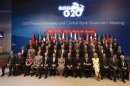 G20 finance ministers and central bank governors pose for a family photo as they meet in Moscow