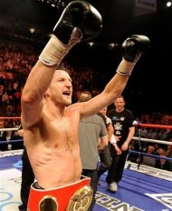 Carl Froch celebrates winning the IBF super-middleweight title with victory over Lucian Bute at the Capital FM Arena in Nottingham, England Saturday, May 26, 2012. (AP Photo/PA, Andrew Matthews) UNITED KINGDOM OUT, NO SALES, NO ARCHIVES