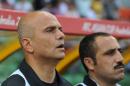 Palestine coach Ahmad Alhasan (left) is impressed with Asian Cup hosts Australia