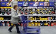 A customer passes a display of tools at a Lowe's store in Quincy, Massachusetts February 23, 2011. REUTERS/Brian Snyder