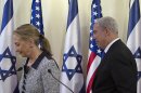 Israel's Prime Minister Benjamin Netanyahu, right, and U.S. Secretary of State Hillary Rodham Clinton leave after delivering joint statements in Jerusalem, Tuesday, Nov. 20, 2012. A diplomatic push to end Israel's nearly weeklong offensive in the Gaza Strip gained momentum Tuesday, with Egypt's president predicting that airstrikes would soon end, the U.S. secretary of state racing to the region and Israel's prime minister saying his country would be a "willing partner" to a cease-fire with the Islamic militant group Hamas.(AP Photo/Baz Ratner, Pool)