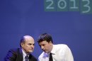 Italian PD (Democratic Party) leader Bersani speakes with mayor of Florence Renzi during a political rally in Florence