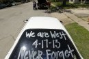A sign is seen on a car window as residents wait to enter a damaged neighborhood Saturday, April 20, 2013, three days after an explosion at a fertilizer plant in West, Texas. The massive explosion at the West Fertilizer Co. Wednesday night killed 14 people and injured more than 160. (AP Photo/Charlie Riedel)