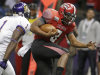 Louisiana-Lafayette quarterback Terrance Broadway (8) scores a touchdown as East Carolina defensive back Chip Thompson (1) defends in the first half of the New Orleans Bowl, an NCAA college football game in New Orleans, Saturday, Dec. 22, 2012. (AP Photo/Dave Martin)