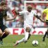 England's Defoe controls the ball next to Belgium's Vertonghen during their international friendly soccer match in London