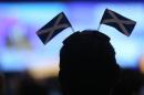 A delegate listens to a speech during the SNP's Spring Conference in Glasgow, Scotland