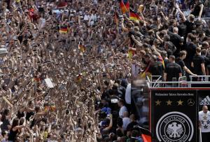 Members of the German soccer squad wave to fans after&nbsp;&hellip;