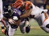 Cincinnati Bengals Maualuga tackles Baltimore Ravens Rice during their NFL football game in Baltimore