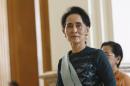 National League for Democracy (NLD) party leader Aung San Suu Kyi arrives at the Union Parliament in Naypyitaw