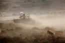 An Israeli tank takes part in a military exercise in the Israeli-annexed Golan Heights near the border with Syria
