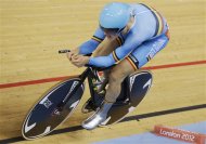 Belgium's Gijs van Hoecke competes in the track cycling men's omnium individual pursuit, during the 2012 Summer Olympics in London, Sunday, Aug. 5, 2012. (AP Photo/Matt Rourke)