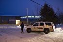 Police investigate the scene of a daytime shooting at the La Loche, Saskatchewan, junior and senior high school on Saturday, Jan. 23, 2016. The shooting left four people dead. (Jason Franson/The Canadian Press via AP)