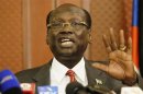 South Sudan's Information Minister Marial Benjamin addresses a news conference in Nairobi