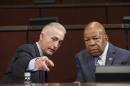 In this Sept. 17, 2014, file photo, Rep. Trey Gowdy, R-S.C., chairman of the House Select Committee on Benghazi, and Rep. Elijah Cummings, D-Md., right, the ranking member, confer as the panel holds its first public hearing to investigate the 2012 attacks on the U.S. consulate in Benghazi, Libya, where a violent mob killed four Americans, including Ambassador Christopher Stevens, on Capitol Hill in Washington. The House Select Committee on Benghazi will meet again on Tuesday, Jan. 27. (AP Photo/J. Scott Applewhite, File)