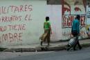 Inscription on a wall in the low income Santa Rita neighborhood in Maracay, 70km from Caracas, reads "Corrupt military, the people are hungry"