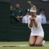 Sabine Lisicki of Germany reacts winning against Maria Sharapova of Russia during a fourth round single match at the All England Lawn Tennis Championships at Wimbledon, England, Monday, July 2, 2012. (AP Photo/Sang Tan)