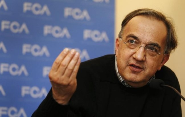 Fiat Chrysler CEO Sergio Marchionne answers questions from the media during the FCA Investors Day at the Chrysler World Headquarters in Auburn Hills, ...