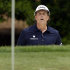 Phil Mickelson reacts as he nearly makes a shot from a sand trap on the fourth hole during the second round of the Wells Fargo Championship golf tournament at Quail Hollow Club in Charlotte, N.C., Friday, May 3, 2013. (AP Photo/Chuck Burton)