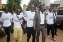 Guinean journalists take part in a protest against violence suffered by journalists in Conakry, on November 14, 2013