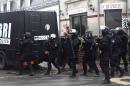 French police detain 9 in massive hunt for 2 suspects