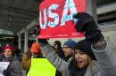 Protesters assemble at John F. Kennedy International Airport in New York, Saturday, Jan. 28, 2017 after two Iraqi refugees were detained while trying to enter the country. On Friday, Jan. 27, President Donald Trump signed an executive order suspending all immigration from countries with terrorism concerns for 90 days. Countries included in the ban are Iraq, Syria, Iran, Sudan, Libya, Somalia and Yemen, which are all Muslim-majority nations. (AP Photo/Craig Ruttle)