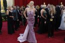 Actress and Oscars presenter Charlize Theron arrives at the 82nd Academy Awards in Hollywood