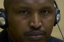 Rwandan-born warlord Bosco Ntaganda is seen during his first appearance before judges of the International Criminal Court in The Hague, Netherlands, Tuesday March 26, 2013, since his surprise surrender to face charges including murder, rape pillaging and using child soldiers in eastern Congo. Ntaganda had been one of the court's longest-sought fugitives until he unexpectedly became the first suspect to voluntarily turn himself in by seeking refuge last week at the U.S. Embassy in the Rwandan capital, Kigali. Ntaganda allegedly led rebels who terrorized eastern Congo in brutal tribal fighting from 2002 till 2003. (AP Photo/Peter Dejong, Pool)