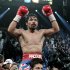 Manny Pacquiao, of the Philippines celebrates after his victory over Mexico's Juan Manuel Marquez during a WBO welterweight title fight Saturday, Nov. 12, 2011, in Las Vegas. (AP Photo/Jae C. Hong)