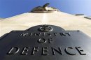 A plaque is seen on the Ministry of Defence building entrance in London