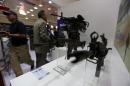 Weapons are displayed on a stand of the Korean firearms manufacturer S and T Motiv during the Baghdad International Fair for Defence and Security in the Iraqi capital, on March 1, 2014