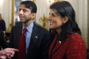 South Carolina Gov. Nikki Haley, right, and Louisiana Gov. Bobby Jindal stand together before President Barack Obama addressed the National Governors Association in the State Dining Room of the White House in Washington, Monday, Feb. 25, 2013. (AP Photo/Charles Dharapak)