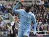 Manchester City's Toure celebrates scoring second goal against Newcastle United during English Premier League soccer match in Newcastle