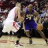 Los Angeles Lakers' Kobe Bryant (24) pushes against Houston Rockets' Jeremy Lin, left, in the first half of an NBA basketball game, Tuesday, Dec. 4, 2012, in Houston. (AP Photo/Pat Sullivan)