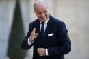 France's Foreign Minister Laurent Fabius arrives to attend a dinner at the Elysee Palace in Paris