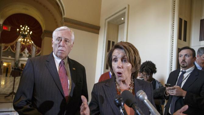 In this Feb. 27, 2015, photo, House Democratic Leader Nancy Pelosi of Calif., accompanied by House Minority Whip Steny Hoyer of Md., voice their objections to the Republican majority during a delay in voting for a short-term spending bill for the Homeland Security Department during a news conference on Capitol Hill in Washington. Democrats didn’t get all they wanted in Congress’ struggle over Homeland Security, but many feel they are winning a broader political war that will haunt Republicans in 2016 and beyond. "It’s a staggering failure of leadership that will prolong this manufactured crisis of theirs and endanger the security of the American people," said Pelosi.  (AP Photo/J. Scott Applewhite)