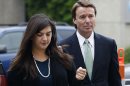 Former presidential candidate and Sen. John Edwards and his daughter, Cate Edwards, arrive at a federal courthouse in Greensboro, N.C., Wednesday, May 9, 2012. Edwards is accused of conspiring to secretly obtain more than $900,000 from two wealthy supporters to hide his extramarital affair with Rielle Hunter, as well as her pregnancy. He has pleaded not guilty to six charges related to violations of campaign finance laws. (AP Photo/Gerry Broome)
