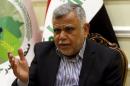 Leader of the Badr Organisation Hadi al-Amiri speaks during an interview with Reuters in Baghdad