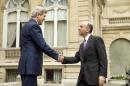 In this May 8, 2015, photo, Secretary of State John Kerry shakes hands with Saudi Foreign Minister Adel al-Jubeir outside of the Chief of Mission Residence in Paris, France. President Barack Obama wants to reassure Arab leaders that an emerging deal with Iran will not further destabilize the Middle East. When officials from Persian Gulf nations meet with Obama this week at Camp David, they will bring wish lists of weapons systems and other items they want for supporting the nuclear agreement. (AP Photo/Andrew Harnik, Pool)