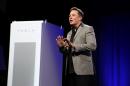 Tesla Motors CEO Elon Musk unveils large utility scale home batteries at the Tesla Design Studio in Hawthorne, California, April 30, 2015