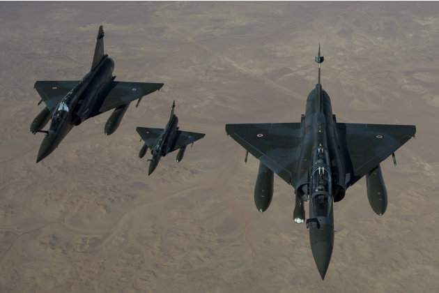 This picture released by the French Army Communications Audiovisual office (ECPAD) shows French Mirage 2000 D aircraft flying to N'Djamena overnight January 11 to 12, after taking off from the French 