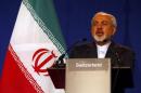 Iran's Foreign Minister Zarif addresses during a joint statement with EU foreign policy chief Mogherini in Lausanne