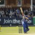 England's Morgan hits out watched by Australia's Wade during the first one-day international at Lord's cricket ground in London